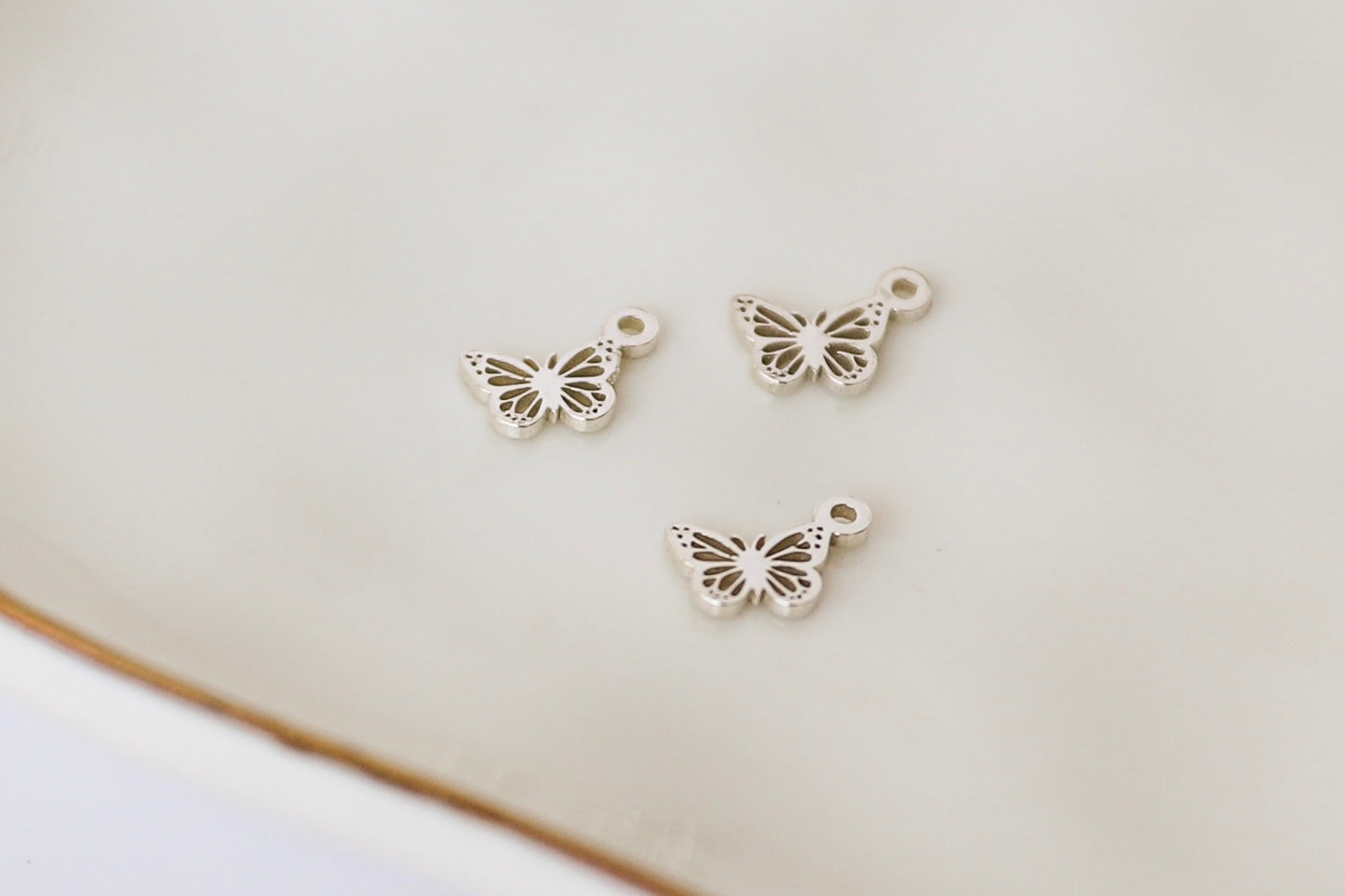 Tiny Butterfly Charm